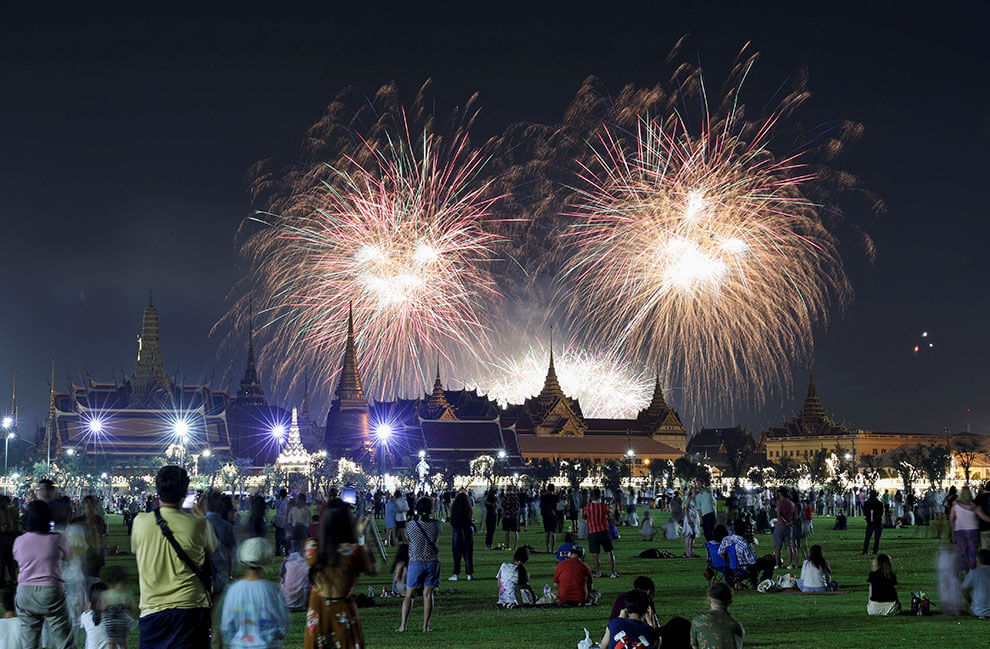 Fireworks explode over the Grand Palace during the New Year celebrations, in Bangkok, Thailand. REUTERS/Athit Perawongmetha