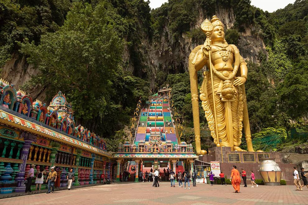 Head north of the capital to visit Batu Caves and the Hindu shrines tucked within. Getty Images