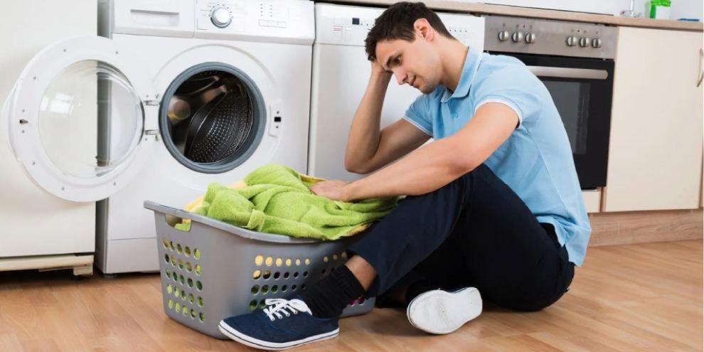 علت جمع شدن آب در ماشین لباسشویی خاموش